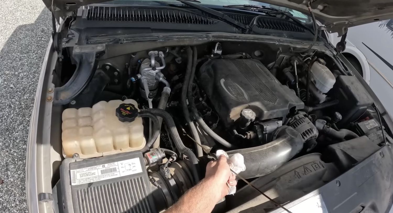 Hands on checks under the hood during a Westminster check engine visit