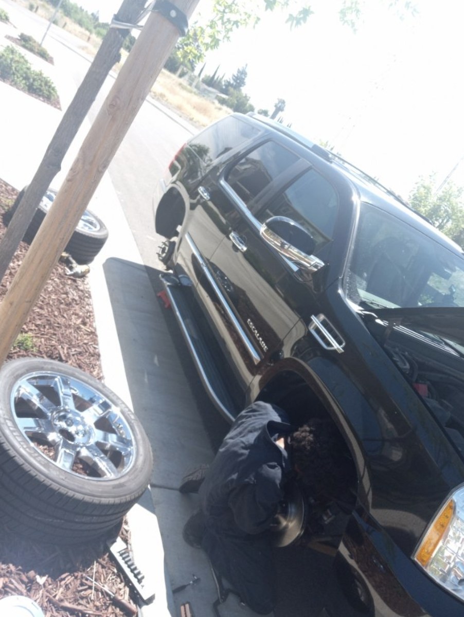 Westminster mobile mechanic starting on a wheel at a driveway service call